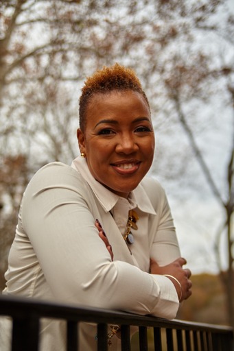 Headshot Photo of smiling Tameca N.Brown